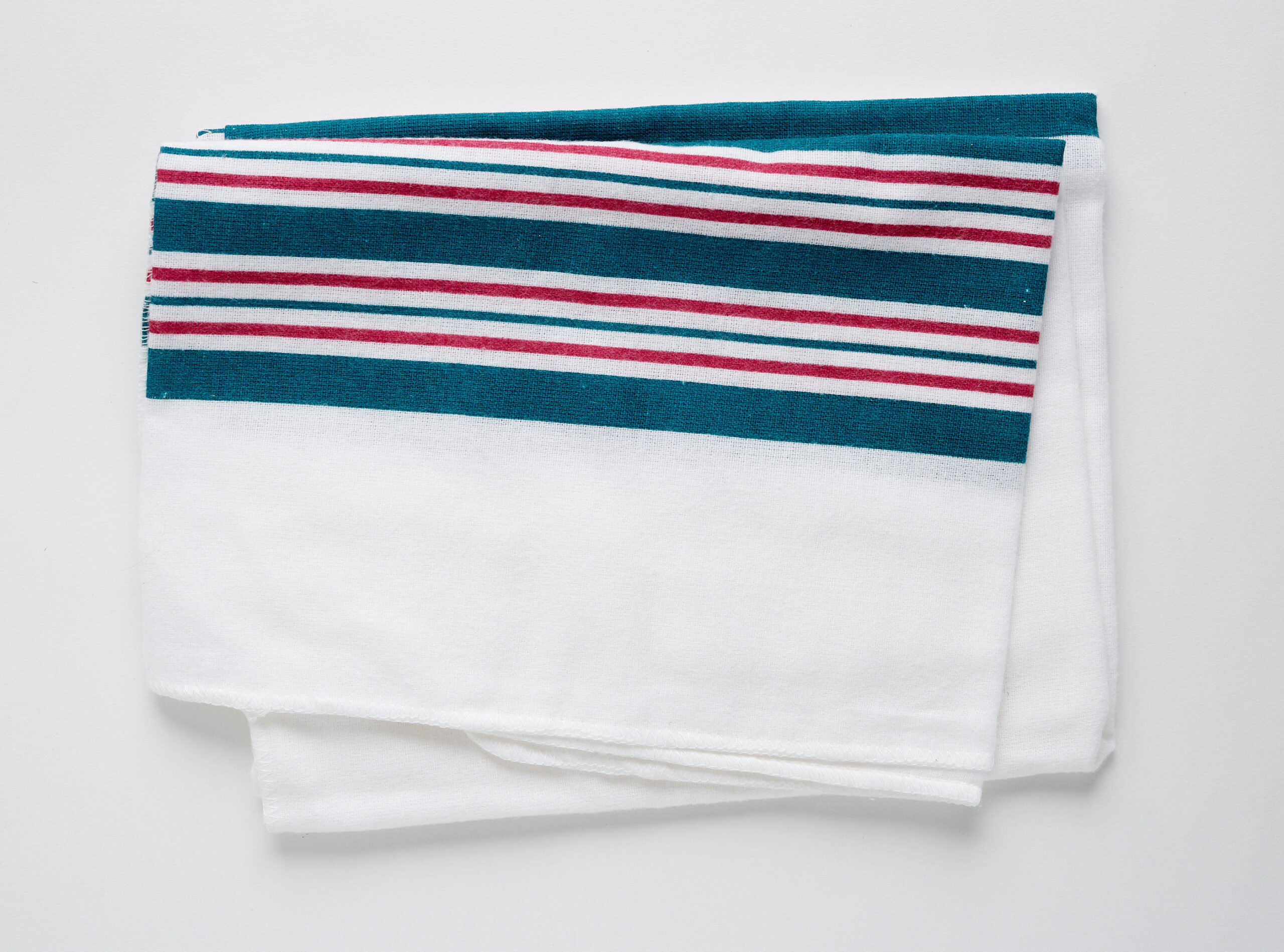 Image of a whote and blue striped infant hospital blanket on a white background