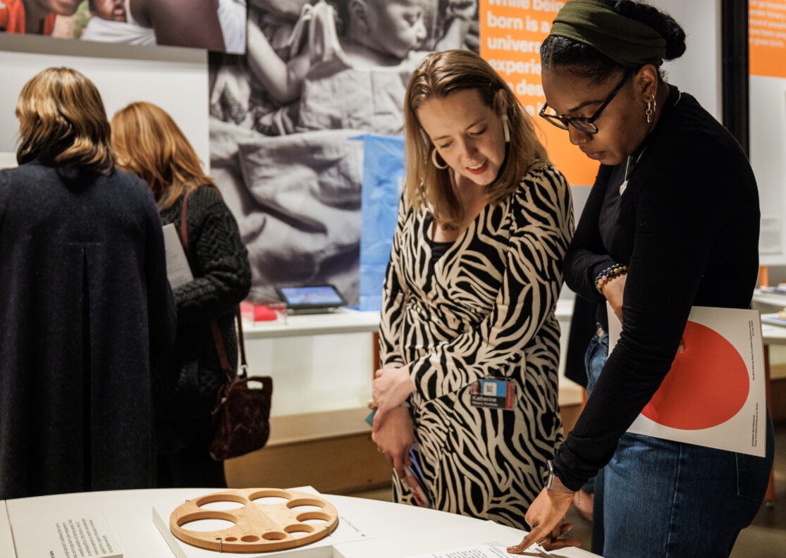 Women gathered together at the Discovery Center in conversation