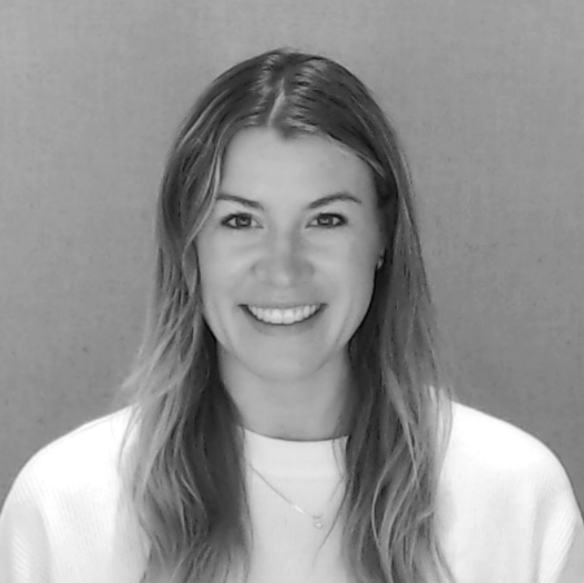 Black and white headshot image of Discovery Center staff member Anna Casparius.