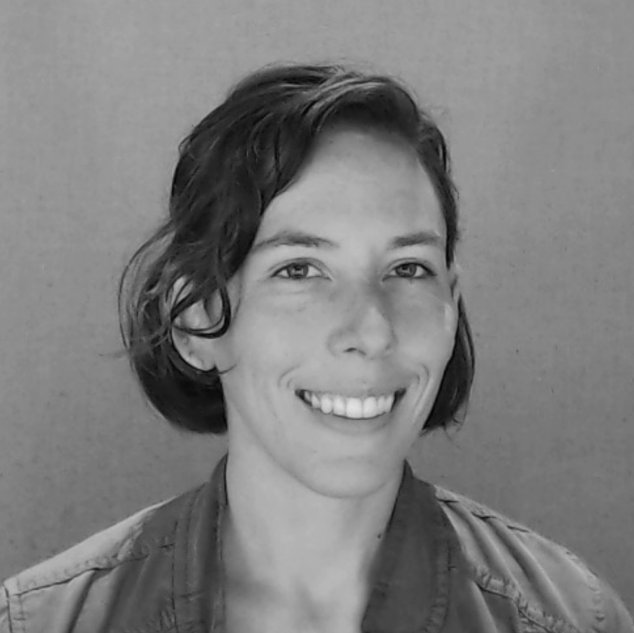 Black and white headshot image of Discovery Center staff member Erin Coté.