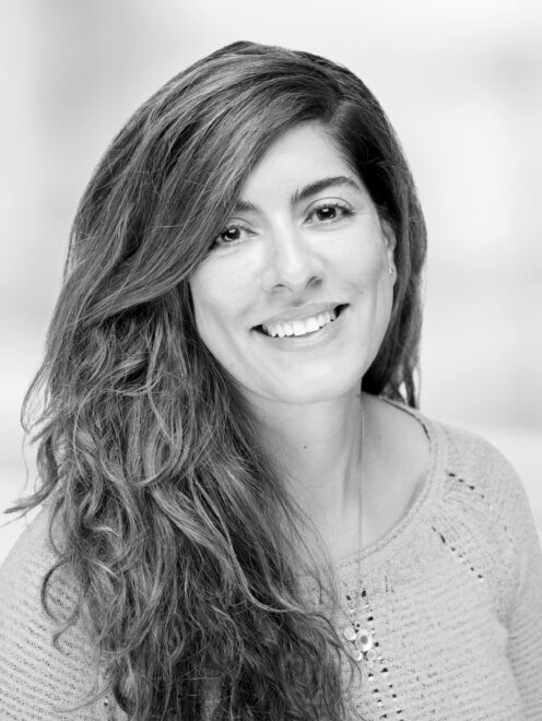 Black and white headshot image of Discovery Center staff member Sarah Bloom.