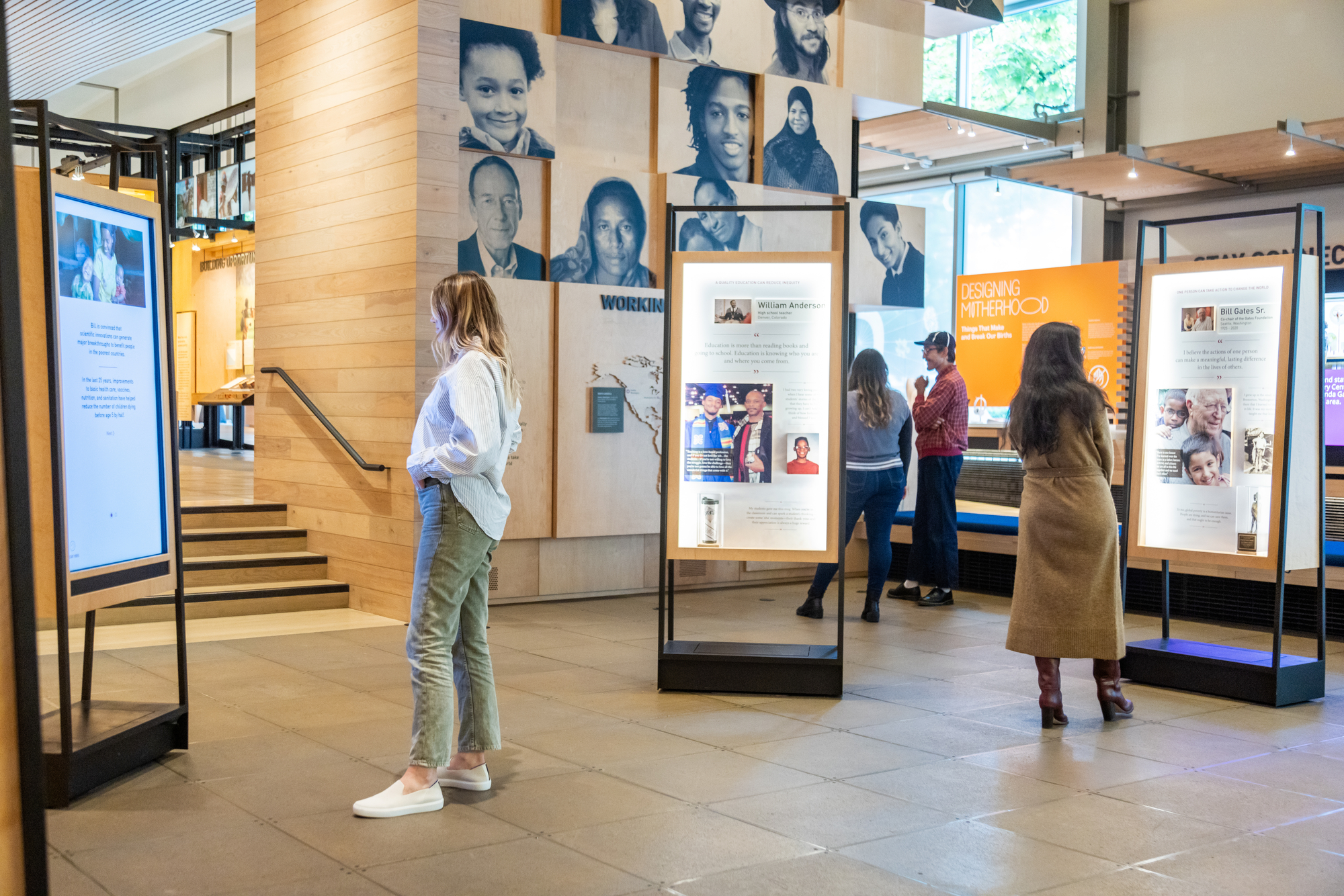 Visitors interact with the stories in the Welcome Gallery