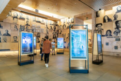 Visitors walk through the Discovery Center Welcome Gallery.