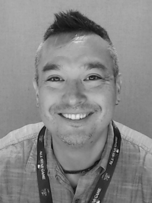 Black and white headshot image of Discovery Center staff member Patrick McMahon.