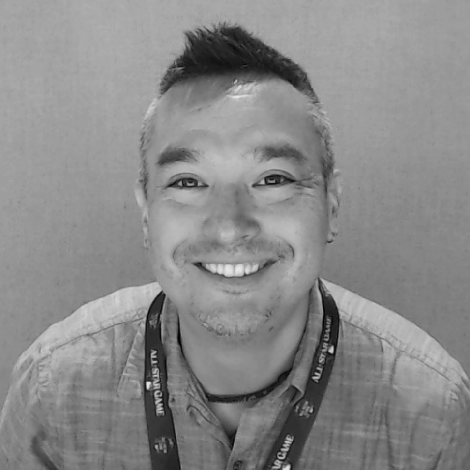 Black and white headshot image of Discovery Center staff member Patrick McMahon.