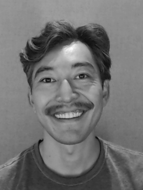 Black and white headshot image of Discovery Center staff member Dane Ishimura.