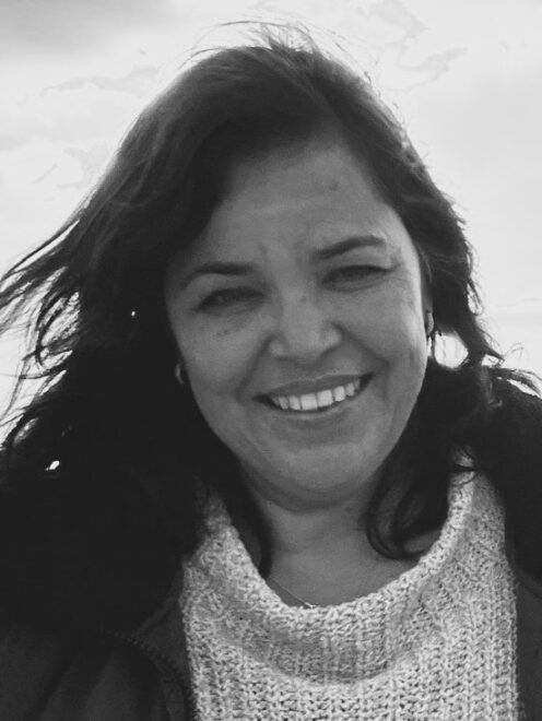 Black and white headshot image of Discovery Center staff member Teresa Gionis.