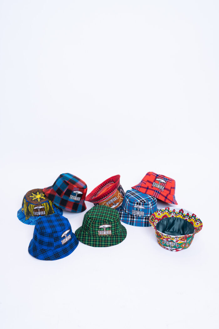 bucket hats arranged in a pile