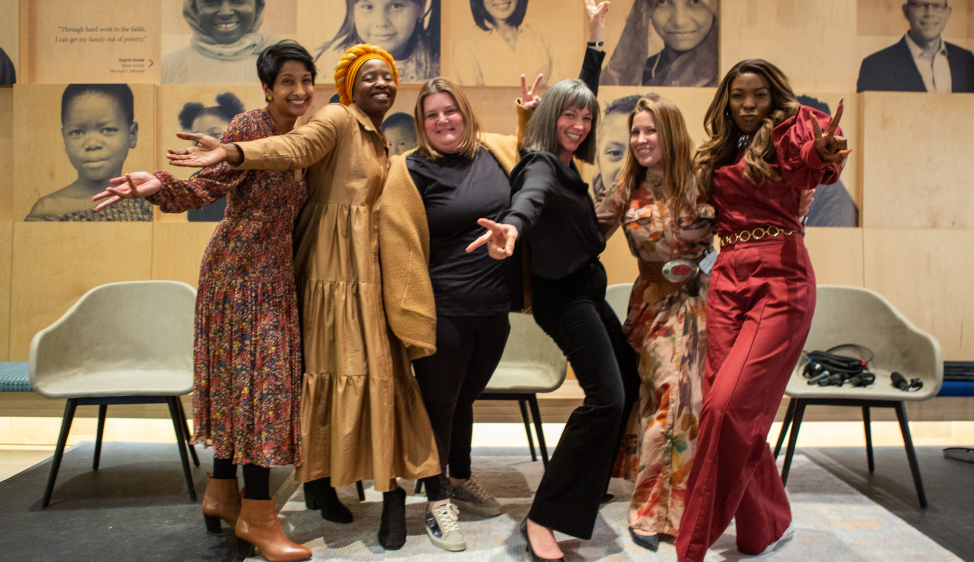 Hema Magge, MD, MS Senior Program Officer, Newborn Health on the Maternal, Newborn, and Child health team at the Bill & Melinda Gates Foundation (left) poses together with the Moth storytellers at the International Women's Day: Stories of Redefining Motherhood celebration at the Bill and Melinda Gates Foundation Discovery Center.