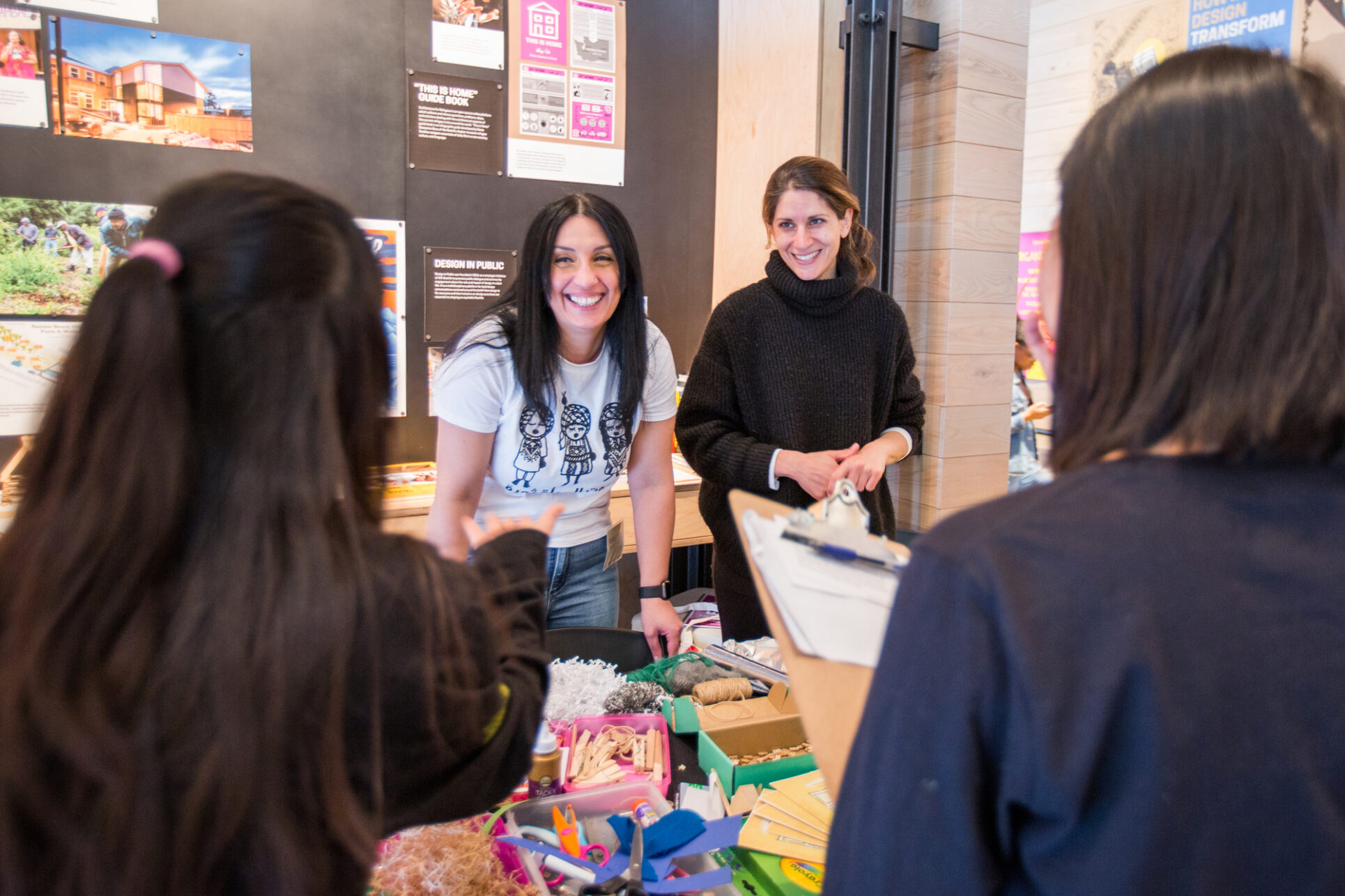 Organizations mingle with attendees at Teen Action Fair