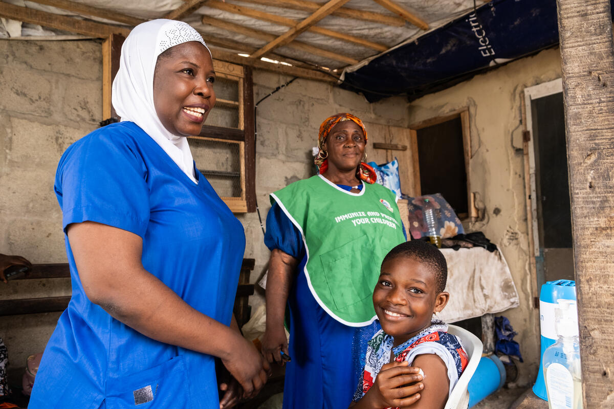 A young girl after receiving the HPV vaccine in a clinic in Nigeria.