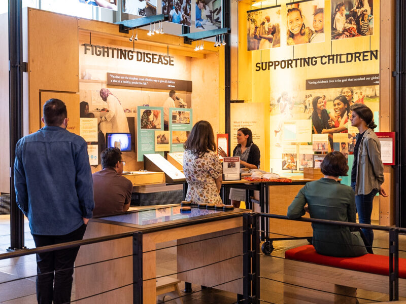 Visitors listen to a speaker during a guided tour at the Gates Foundation Discovery Center.