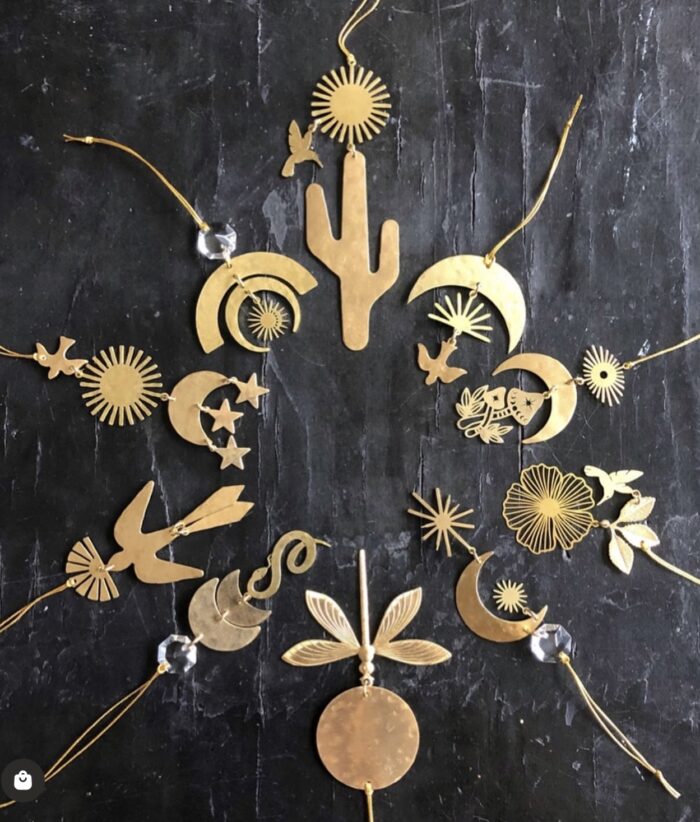 Gold necklaces on a back background