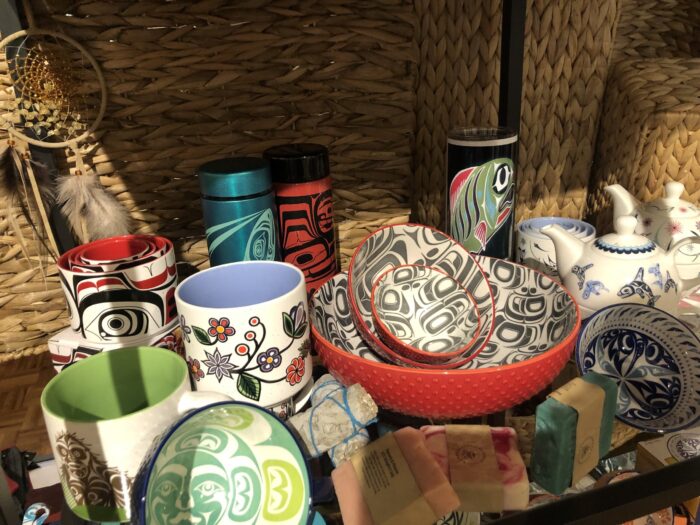 Various pottery and canisters in coast salish designs
