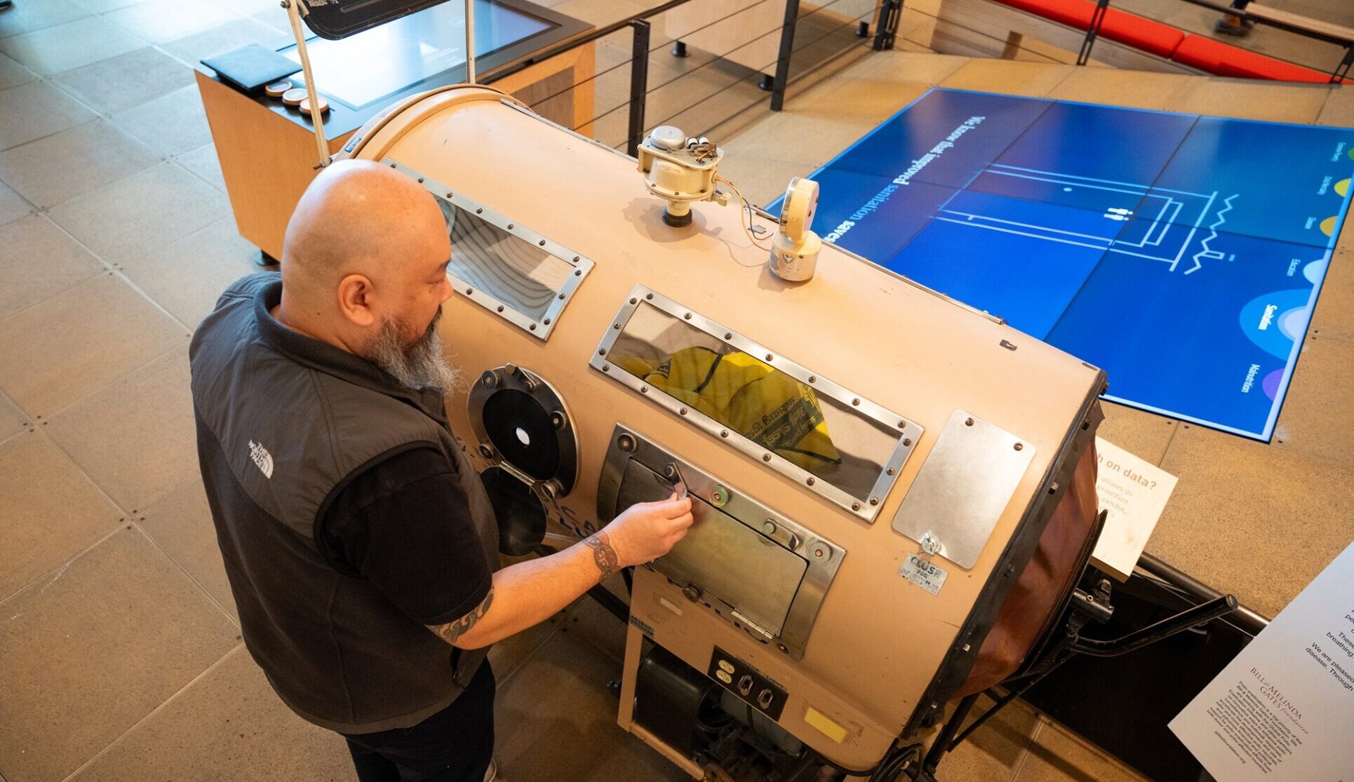 Guest participates in a tactile tour at the Discovery Center.