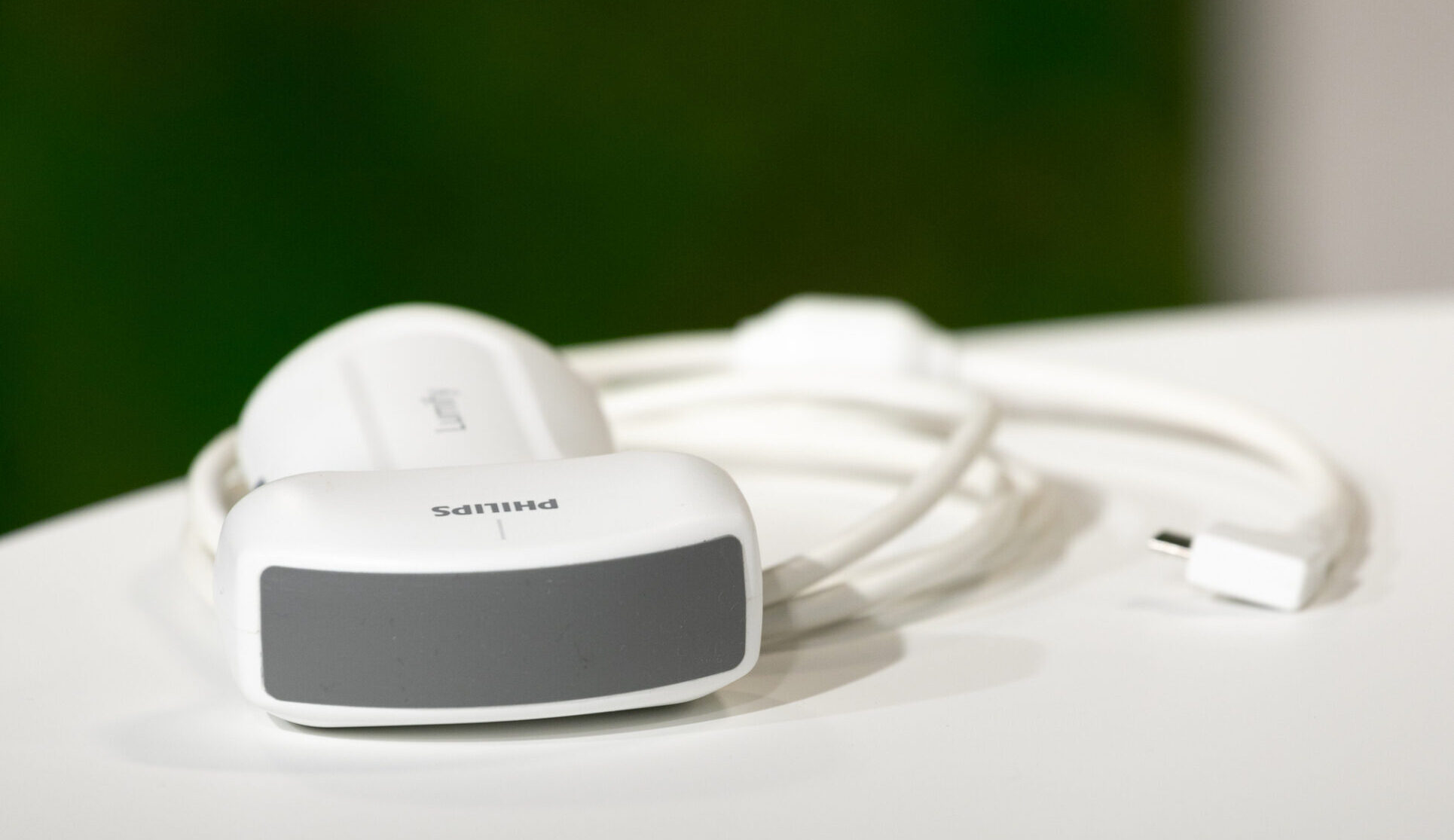 Image of AI enabled ultrasound wand on a white table.