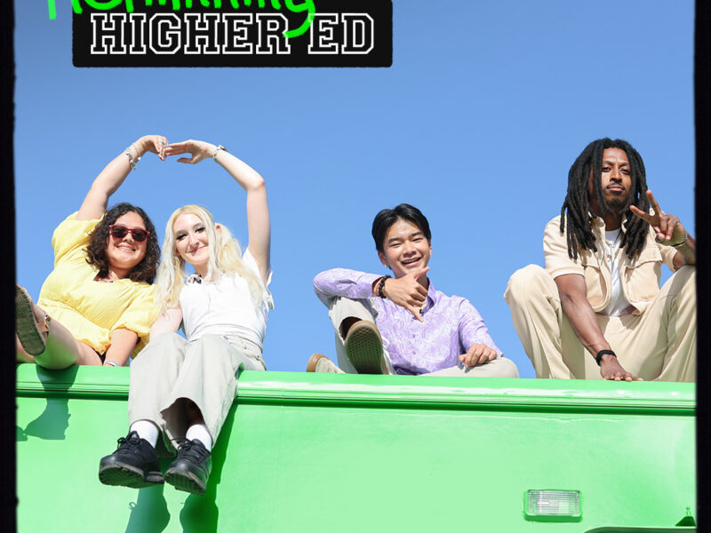 Roadtrippers sit on top of their RV