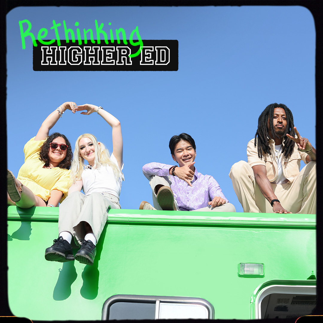 Roadtrippers sit on top of their RV